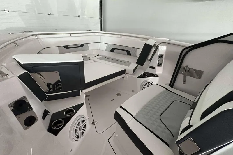 Slide: The Image of 2025 Blackfin 302 CC boat interior with sleek seating and modern design features. - 11