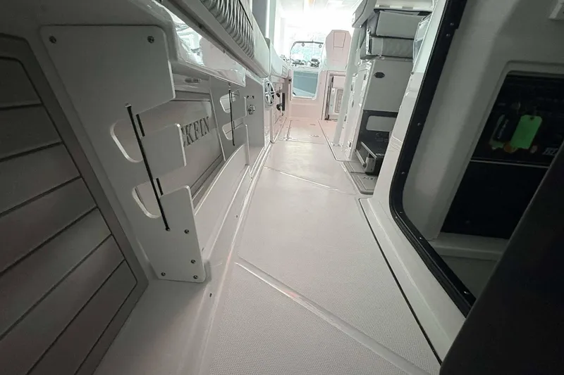 Slide: The Image of 2025 Blackfin 302 CC boat interior, showcasing sleek design and modern features. - 14