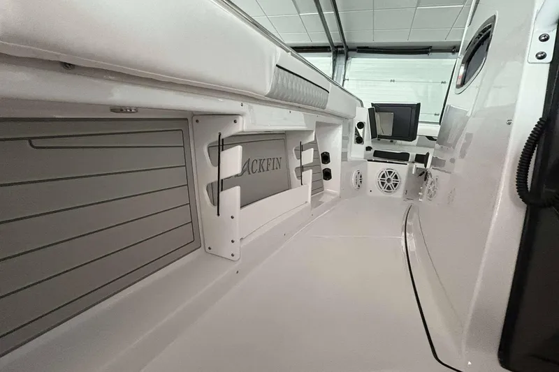 Slide: The Image of 2025 Blackfin 302 CC boat interior with sleek design and modern features. - 19