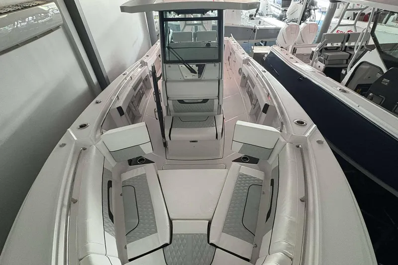 Slide: The Image of 2025 Blackfin 302 CC boat interior with spacious seating and modern design. - 5