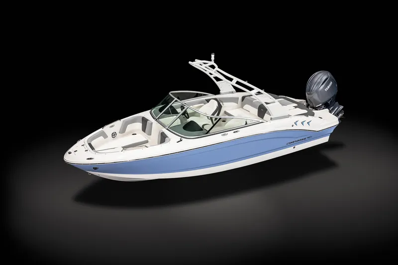 Slide: The Image of 2025 Chaparral SSI boat with sleek design and blue accents on a black background. - 7