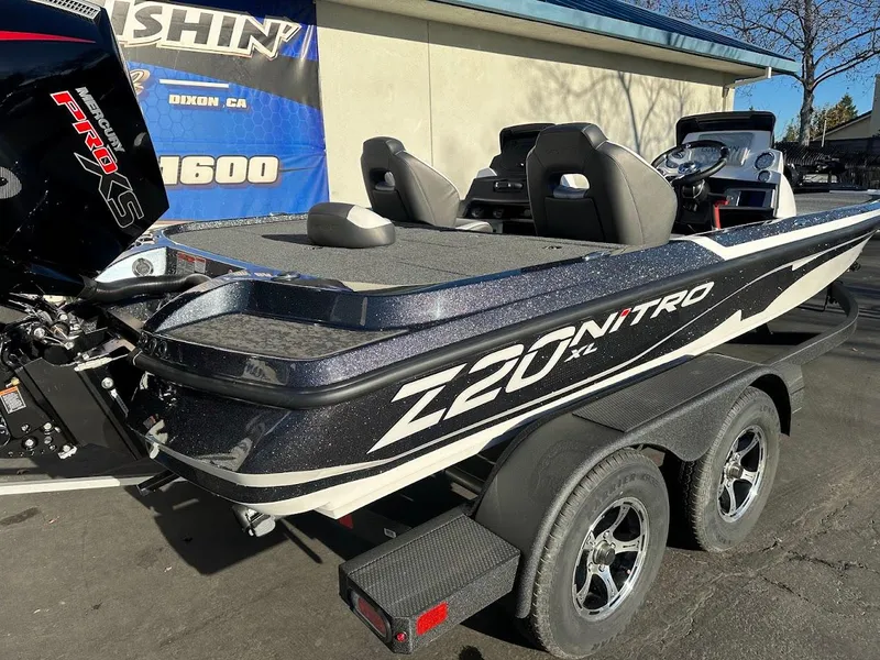 Slide: The Image of 2025 Nitro Z20 XL Pro boat on trailer, outdoor display. - 10