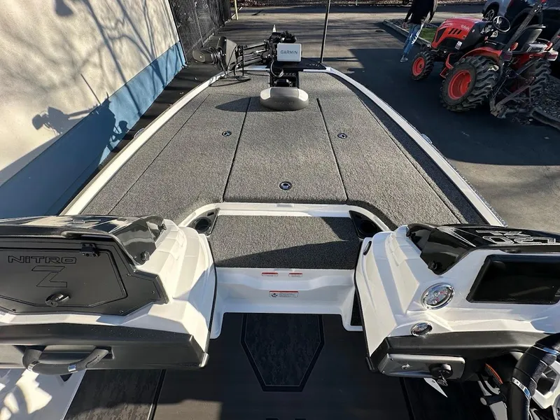Slide: The Image of 2025 Nitro Z20 XL Pro boat interior with advanced dashboard and spacious deck. - 21