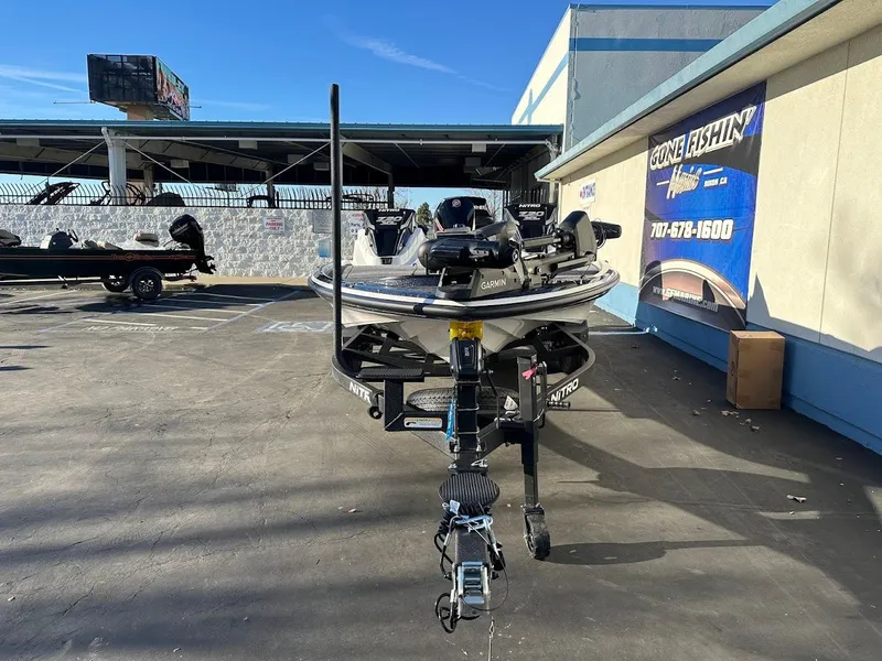 Slide: The Image of 2025 Nitro Z20 XL Pro boat on trailer in parking lot. - 3