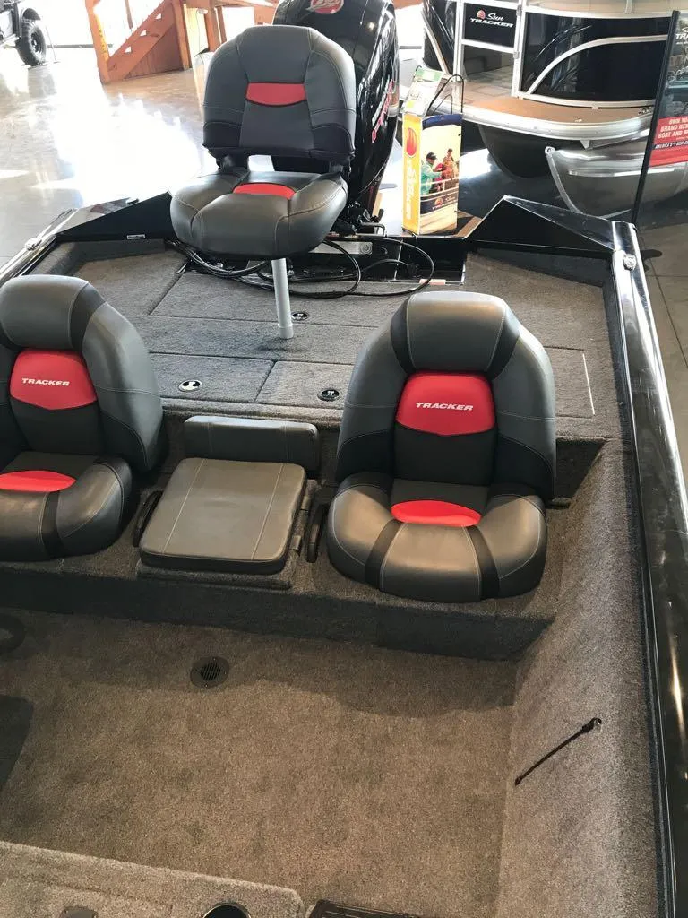 Slide: The Image of 2025 Tracker Pro Team 195 Tournament Edition boat interior with cushioned seats. - 7