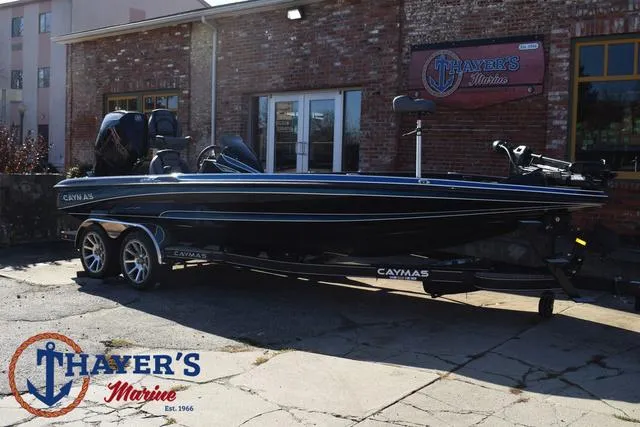 Slide: The Image of 2025 Caymas CX 21 PRO boat at Thayer's Marine dealership. - 1