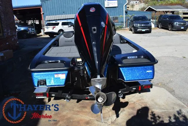 Slide: The Image of 2025 Caymas CX 21 PRO boat with powerful outboard motor, displayed at Thayer's Marine. - 10