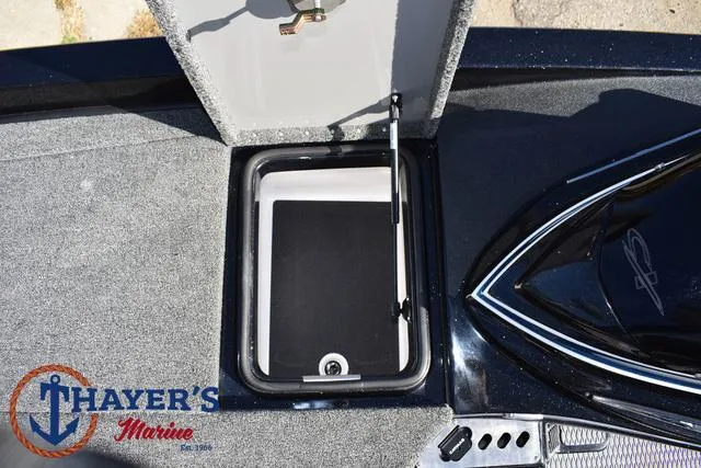 Slide: The Image of 2025 Caymas CX 21 PRO boat storage compartment, Thayer's Marine logo visible. - 16