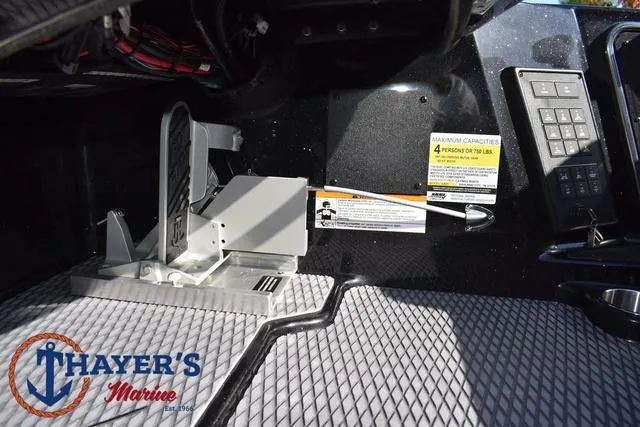 Slide: The Image of 2025 Caymas CX 21 PRO boat interior with control panel and foot pedal. - 28
