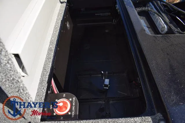 Slide: The Image of 2025 Caymas CX 21 PRO boat compartment with trolling motor switch. - 38