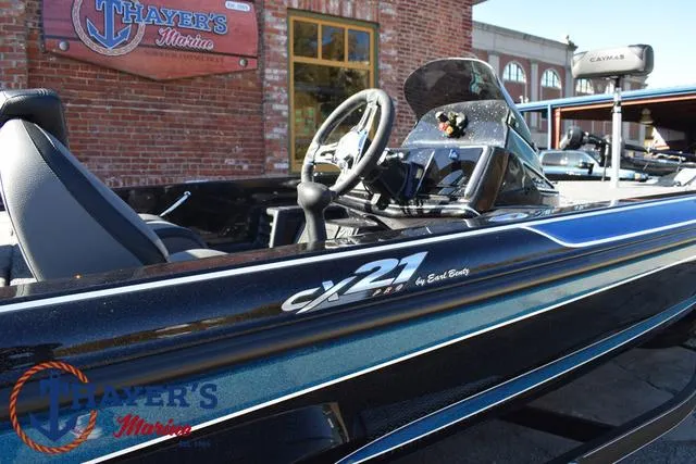 Slide: The Image of 2025 Caymas CX 21 PRO boat at Thayer's Marine dealership. - 44