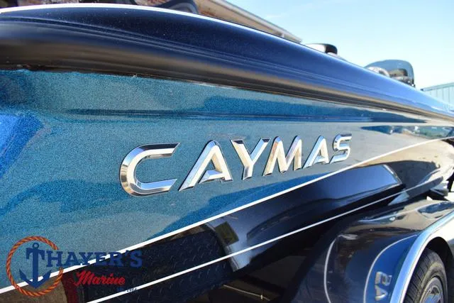 Slide: The Image of 2025 Caymas CX 21 PRO boat with sleek blue design at Thayer's Marine. - 45
