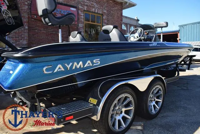 Slide: The Image of 2025 Caymas CX 21 PRO boat with dual-axle trailer, displayed at Thayer Marine. - 48