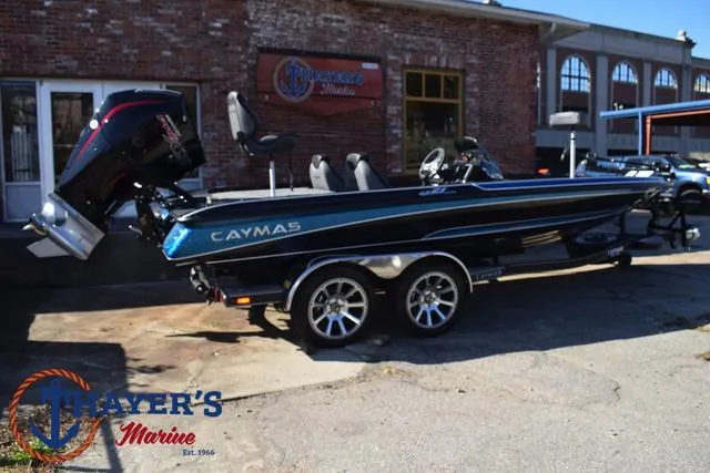 Slide: The Image of 2025 Caymas CX 21 PRO boat parked outside Thayer's Marine. - 49