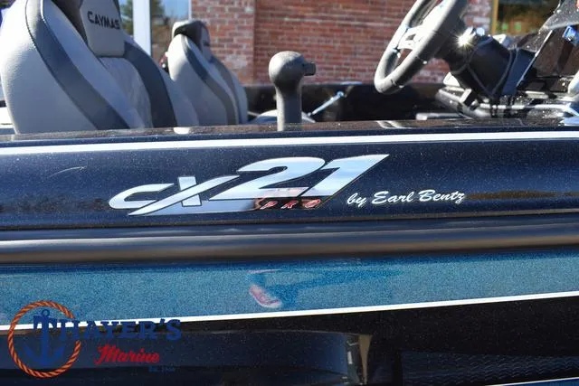 Slide: The Image of 2025 Caymas CX 21 PRO boat detail with branding and logo. - 5