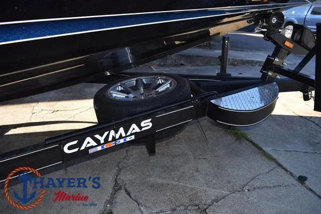 Slide: The Image of 2025 Caymas CX 21 PRO boat trailer with spare tire at Thayer's Marine. - 7