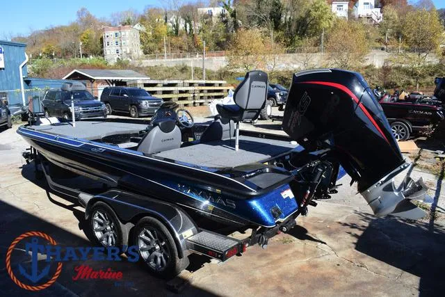 Slide: The Image of 2025 Caymas CX 21 PRO boat on trailer at Hayer's Marine dealership. - 9