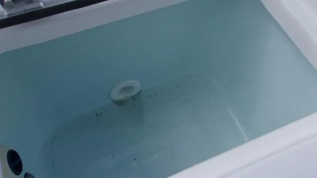 Slide: The Image of Livewell in 2025 Sportsman Heritage 231 boat, filled with water. - 14