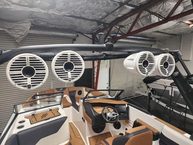 Slide: The Image of 2024 ATX Boats 24 TYPE-S interior with premium audio system and sleek design. - 10