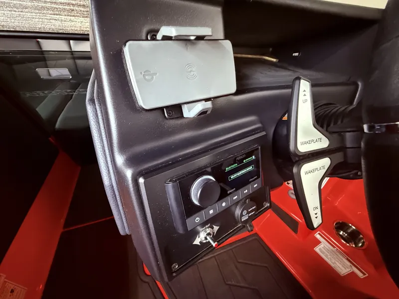 Slide: The Image of Interior of 2025 Moomba Tykon with controls and Bluetooth display. - 45