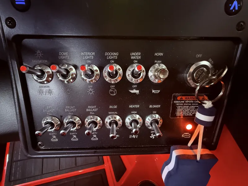 Slide: The Image of Moomba Tykon 2025 dashboard with switches and key. - 46