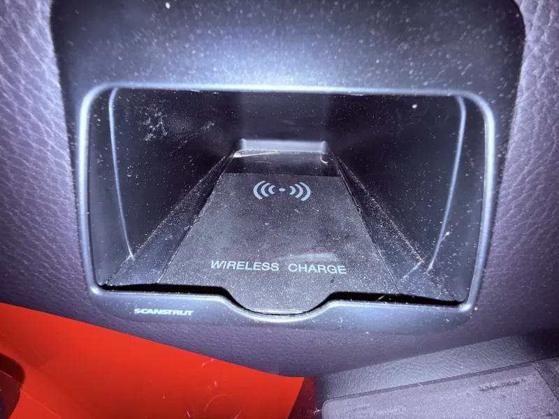 Slide: The Image of Moomba Tykon 2025 wireless charging compartment in vehicle. - 47