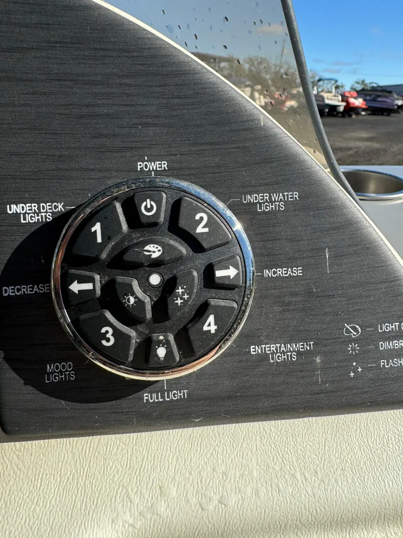 Slide: The Image of Control panel of a 2019 Veranda VP25RCT boat with lighting options. - 12