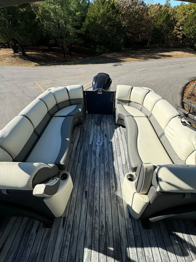 Slide: The Image of 2019 Veranda VP25RCT pontoon boat with spacious seating and wooden deck. - 14