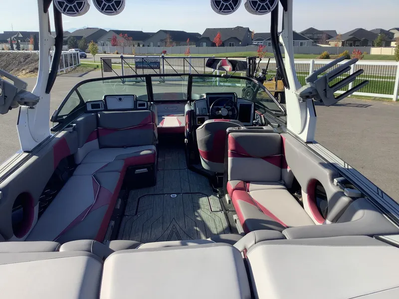 Slide: The Image of 2019 Supra SL450 boat interior with spacious seating and modern dashboard. - 10