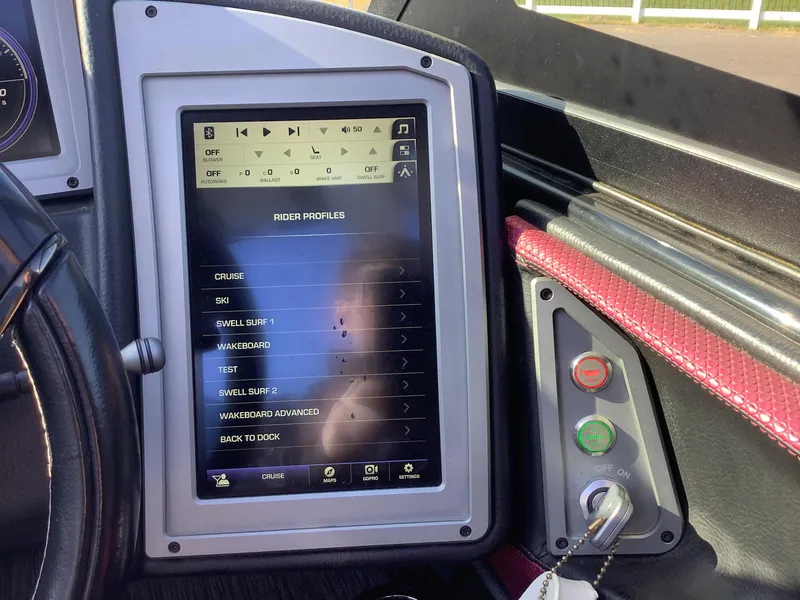 Slide: The Image of 2019 Supra SL450 dashboard with touchscreen displaying rider profiles and control options. - 20