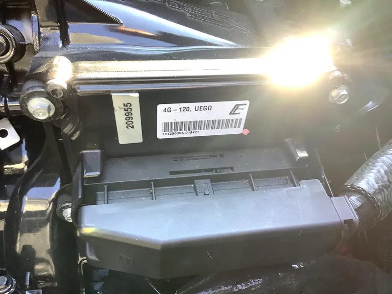 Slide: The Image of Close-up of 2019 Supra SL450 engine component with visible part numbers and labels. - 33