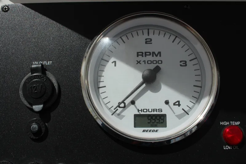 Slide: The Image of Tachometer of 2007 Back Cove 29 boat showing RPM and engine hours. - 12