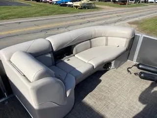 Slide: The Image of 2019 Harris FloteBote Cruiser 220 pontoon boat with beige seating on a sunny day. - 5