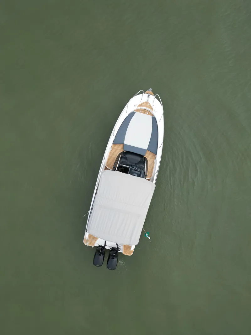 Slide: The Image of Aerial view of 2024 Sessa Marine Key Largo 27 boat on water. - 3