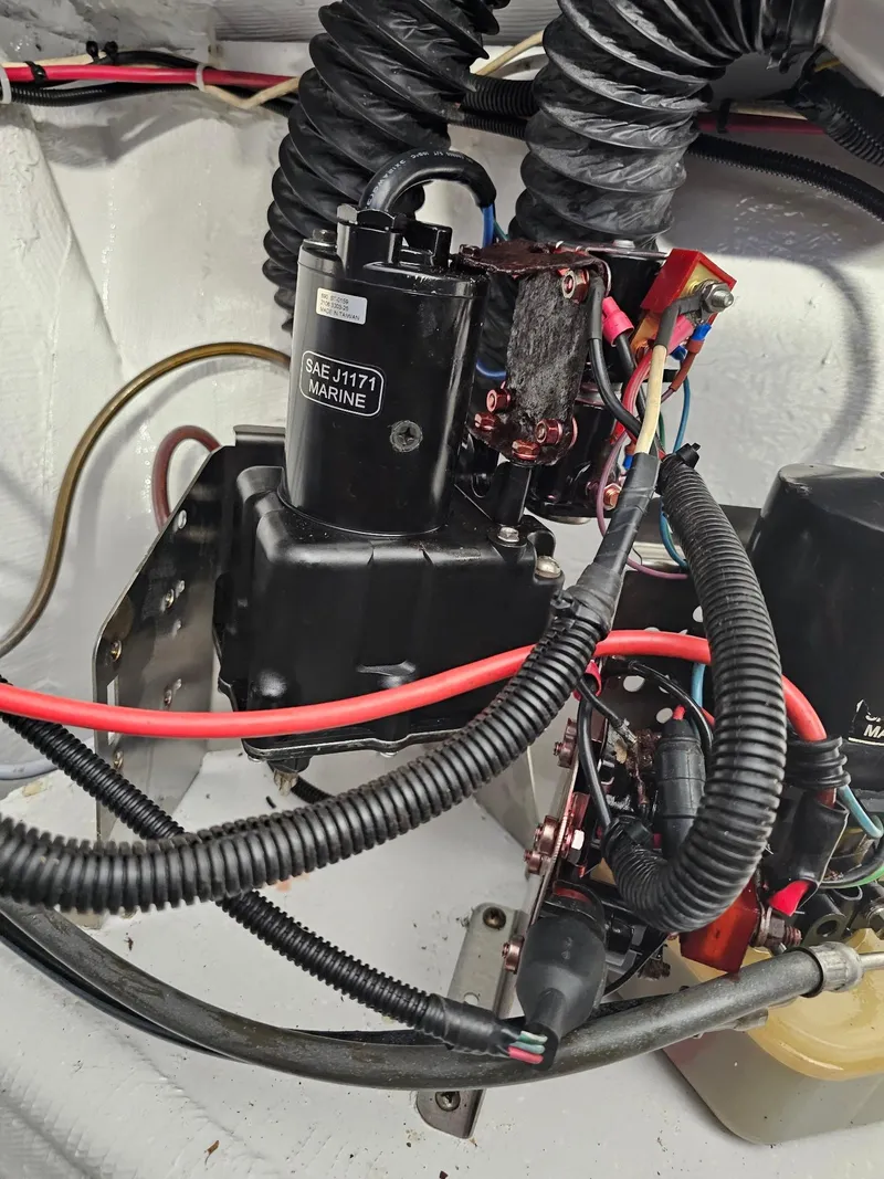 Slide: The Image of Engine compartment of 1983 Chris-Craft 312 SL with wiring and components. - 9