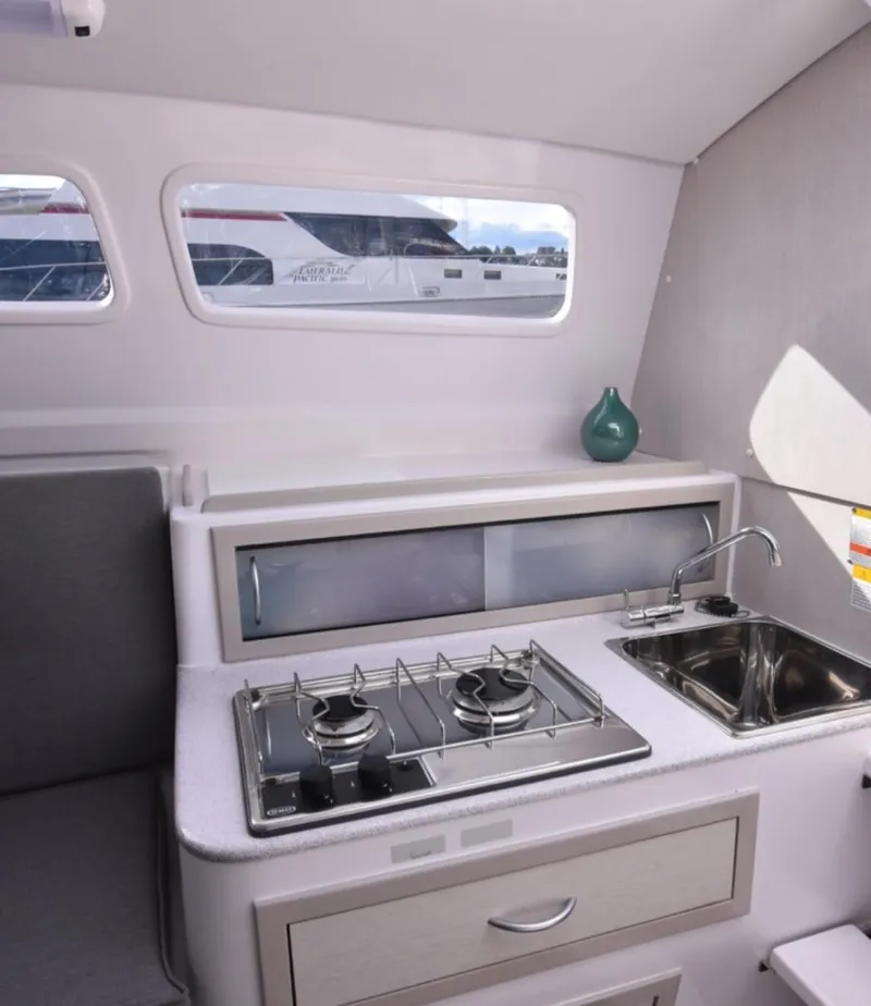 Slide: The Image of Modern kitchen area in a 2025 Corsair 970 yacht with stove and sink. - 8