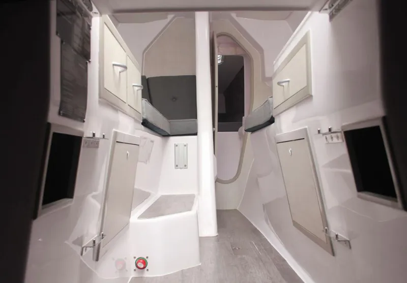 Slide: The Image of Interior of 2025 Corsair 970 sailboat, featuring modern design and compact storage solutions. - 9