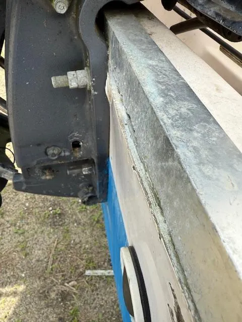 Slide: The Image of Close-up of a 2000 Grady-White 222 FISHERMAN boat's metal components. - 4