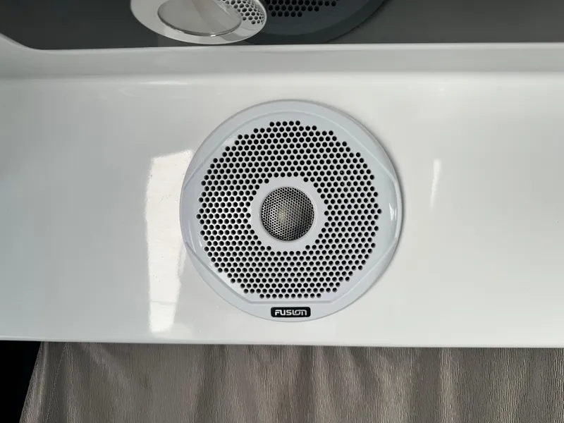 Slide: The Image of Fusion speaker on 2019 Jeanneau NC 895 boat interior. - 12