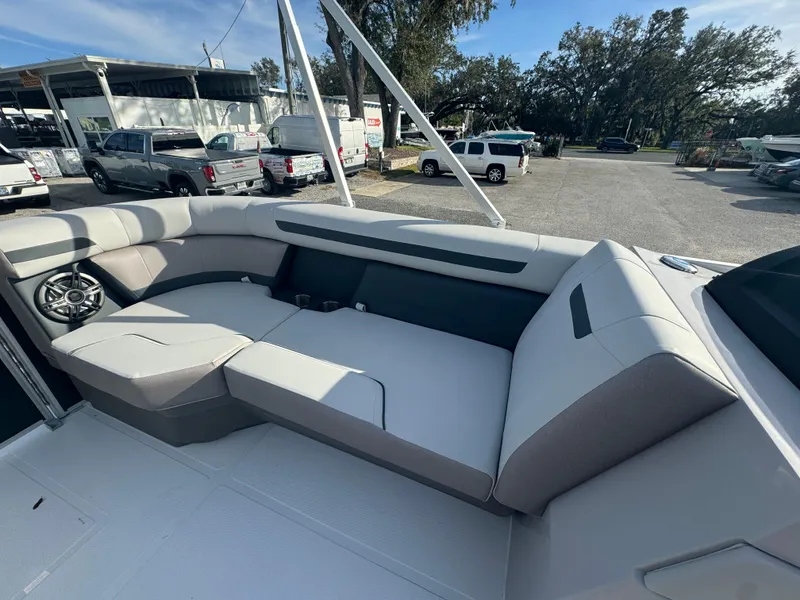 Slide: The Image of 2024 Hurricane FunDeck 2260 RE boat interior with spacious seating and modern design. - 13