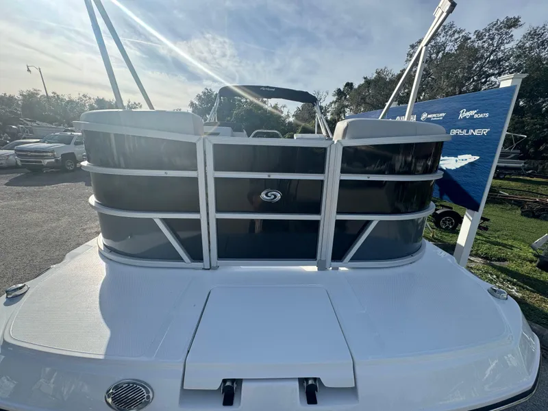 Slide: The Image of 2024 Hurricane FunDeck 2260 RE boat displayed outdoors. - 5