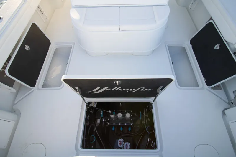 Slide: The Image of 2024 Yellowfin 39 boat interior with open storage compartments. - 12