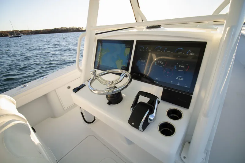 Slide: The Image of 2024 Yellowfin 39 boat dashboard with modern navigation and control systems. - 4