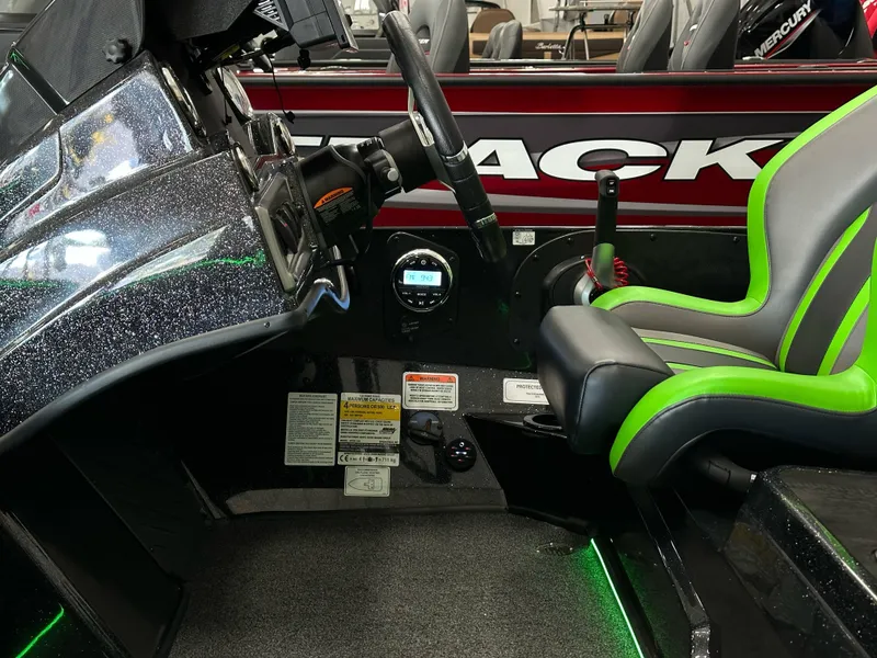 Slide: The Image of 2025 Nitro Z19 boat storage compartments open, showcasing ample space and organized layout. - 11