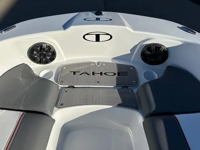 Slide: The Image of 2025 Tahoe T21 boat interior with speakers and seating. - 4