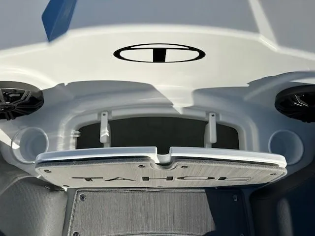 Slide: The Image of 2025 Tahoe T21 boat interior with storage compartment and speakers. - 5