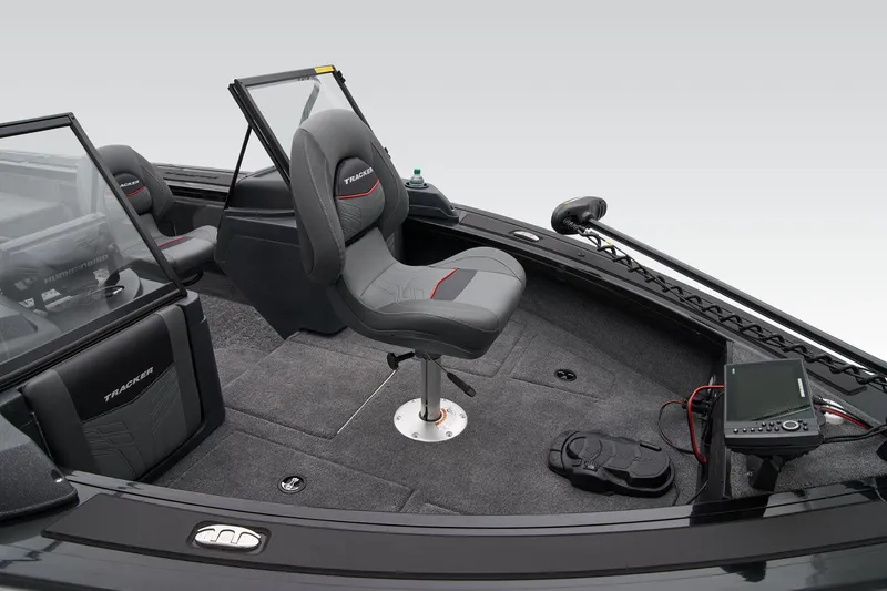 Slide: The Image of 2025 Tracker Targa V-19 WT boat on trailer with steps, red hull, and winch system. - 14