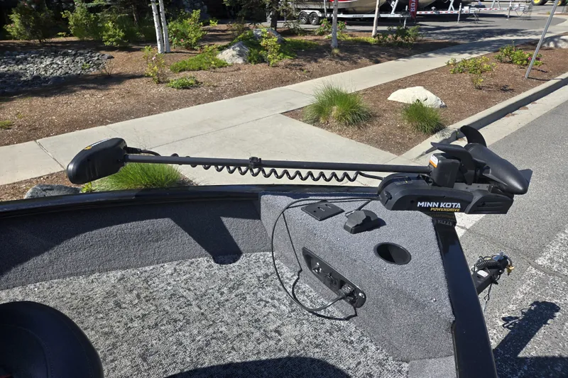 Slide: The Image of 2025 Tracker Pro Guide V-175 WT boat with Minn Kota trolling motor on deck. - 17