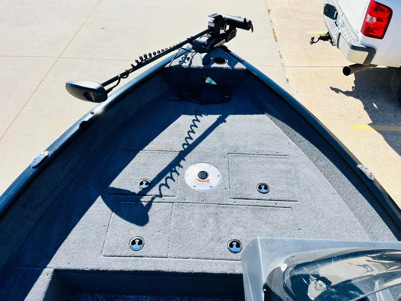 Slide: The Image of 2025 Tracker Pro Guide V-16 SC boat deck with trolling motor. - 8