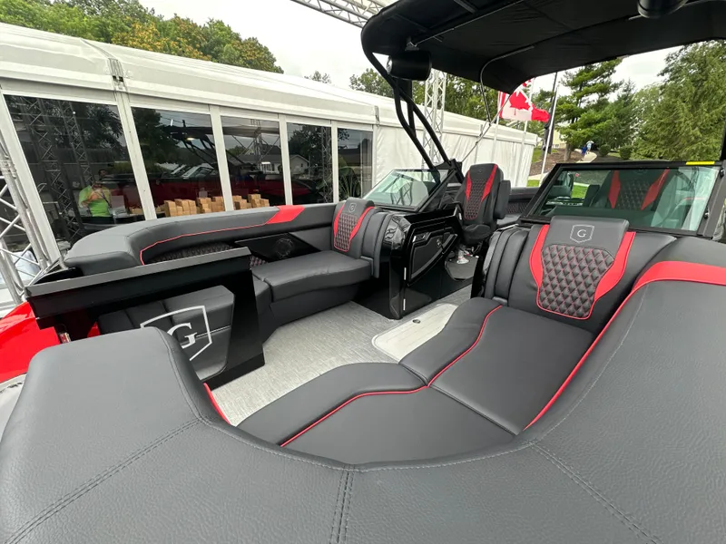 Slide: The Image of Luxurious interior of 2024 Godfrey XP 27' Windshield boat with stylish seating and modern design. - 3